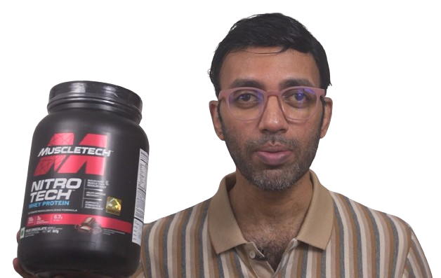 image showing dr prasoon holding muscle tech protein blend